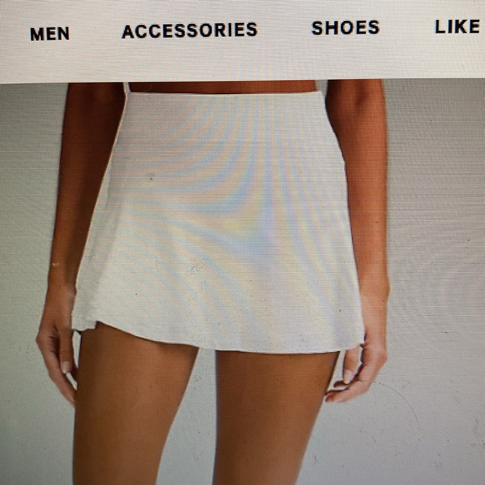 Brand new Lululemon tennis skirt in white.